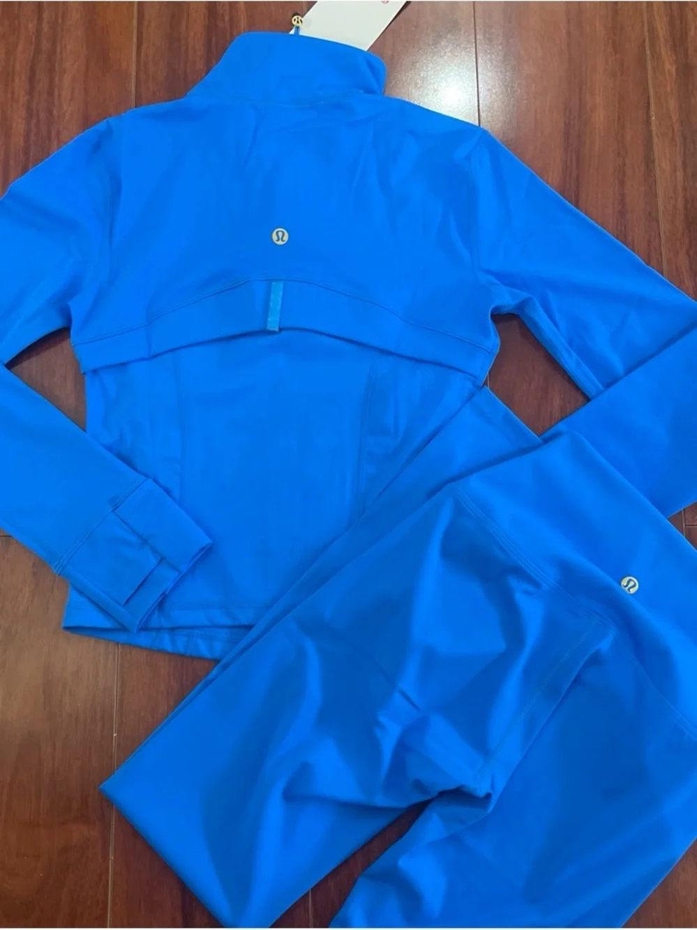 lululemon athletica Electric Blue Bomber-Style Zip Jacket leggings set.